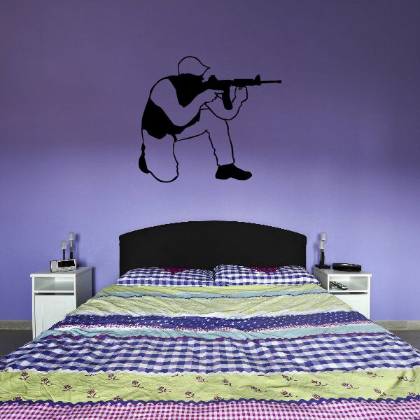 Outlined soldier aiming decal wall art with rifle, black silhouette