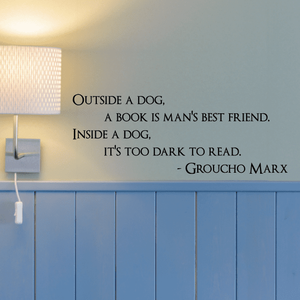 Wall decal quote text: Outside a dog, a book is man's best friend; Inside a dog, Groucho Marx