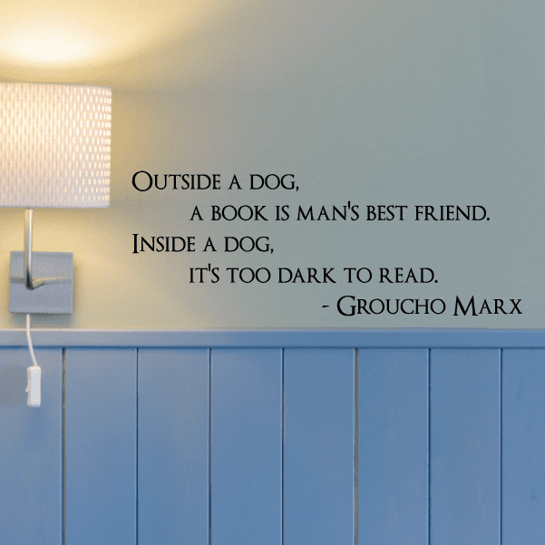 Wall decal quote text: Outside a dog, a book is man's best friend; Inside a dog, Groucho Marx