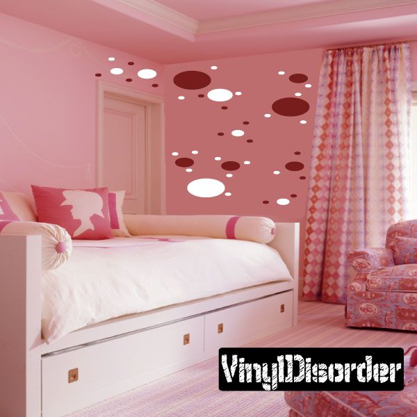 Oval wall decals kit with scattered dark red and white oval shapes