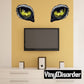 Owl eye sticker set: two black feathers with yellow-green glowing pupils