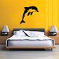 Leaping dolphin wall decal, black silhouette with yellow highlights