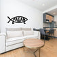 Fish-shaped Pagan decal in black and white, with “PAGAN” lettering across the center