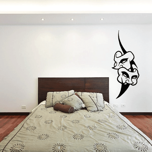 Tribal face mask wall decal with curved horned design in black