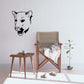 Cougar head decal with black outline and white face, front view