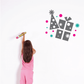 Printed party decal with party hat, gift boxes, stars, and dot confetti
