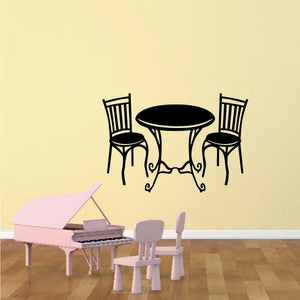 Patio chair and table wall decal set with three black chairs and round table