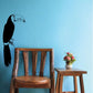 Toucan bird decal with black body and blue-gray beak, wall sticker