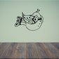 Peacock fluttering decal in black outline with patterned feathers and eye spot