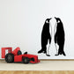 Penguin couple wall decal showing two standing black-and-white penguins facing inward