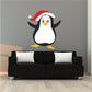 Penguin with Santa hat sticker, cartoon black-and-white penguin with red Santa cap