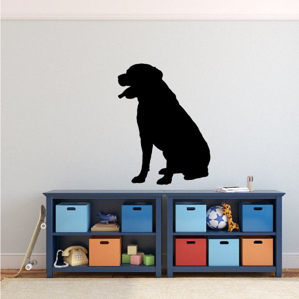 Black dog silhouette decal with standing paw and wagging tail