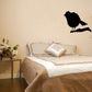 Perched cuckoo bird decal, black bird silhouette standing on a branch