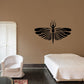 Winged insect wall decal with black butterfly-like wings and antennae