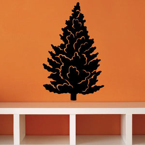 Pine tree wall decal, black vinyl silhouette on a wall