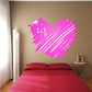 Pink graffiti heart sticker with spray-paint speckles and stripes