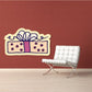 Pink polka dot present sticker with gift box, blue ribbon and dark outlines