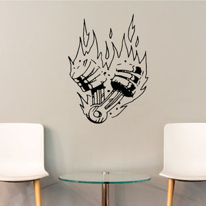 Stylized piston engine decal with flame and mechanical hand design, black