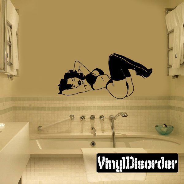 Black lingerie pinup wall decal of a reclining woman in high heels