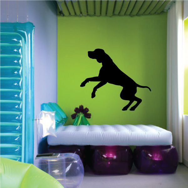 Black coonhound decal silhouette, dog playing pose mid-run on wall