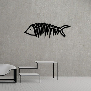 Black pointed fish skeleton wall decal with spined ribcage and tail