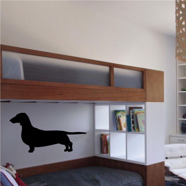 Black dachshund pointing decal silhouette, simple outline design