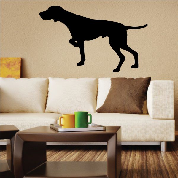 Pointing English Pointer decal with black dog silhouette on a wall