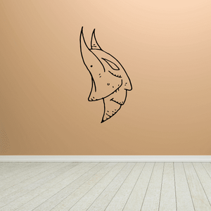 Pointy gargoyle mask decal with outlined profile face, pointed ears