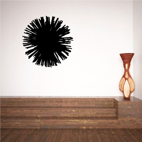 Black pom pom wall decal with spiky round design