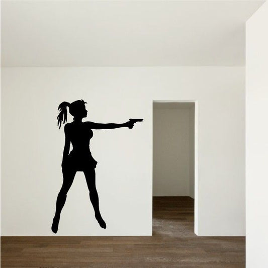 Image of Ponytail Woman with Handgun Decal