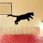 Black pouncing cougar wall decal with raised paws