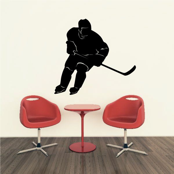 Hockey player decal, black silhouette leaning forward with stick