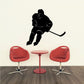 Hockey player decal, black silhouette leaning forward with stick