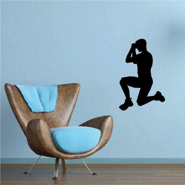 Praying man sports game decal, black silhouette kneeling with hands clasped