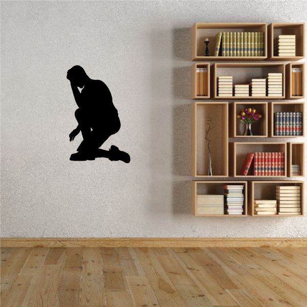 Black praying man on one knee wall decal silhouette