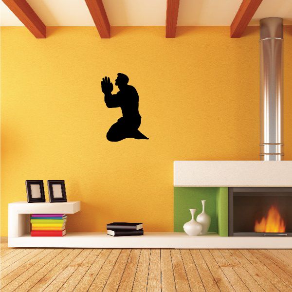 Black praying muscle man wall decal, open hands kneeling silhouette
