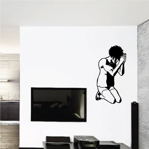 Praying teen wall decal of kneeling teen with hands clasped