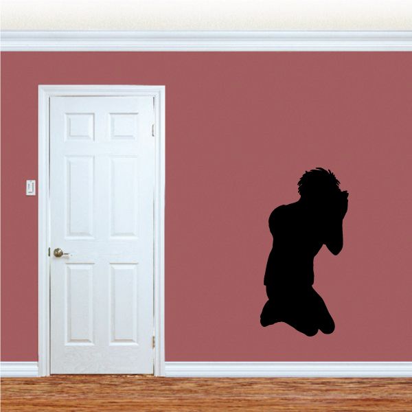 Praying teen silhouette decal, dark kneeling figure with hands clasped