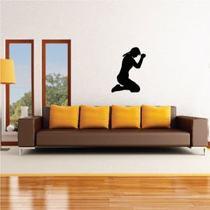 Praying woman on knees wall decal, black silhouette