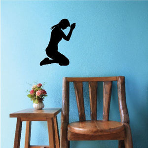 Praying woman decal: kneeling silhouette with head bowed