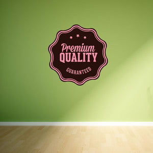 Premium Quality Guaranteed badge wall decal, pink outlined seal with black text and stars