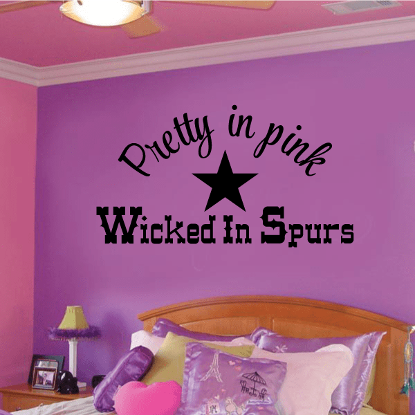 Pink and black wall decal: 'Pretty in pink' star over 'Wicked in Spurs'