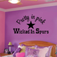Pink and black wall decal: 'Pretty in pink' star over 'Wicked in Spurs'