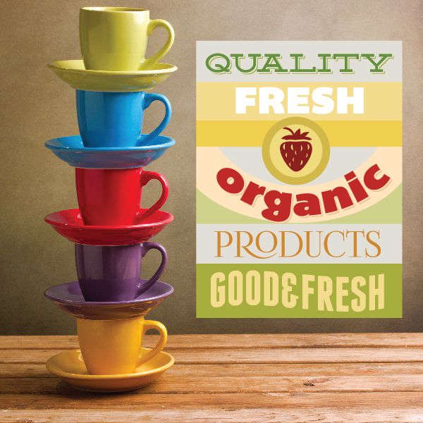 Square sticker with green and yellow text: QUALITY FRESH Organic PRODUCTS GOODFRESH