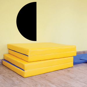 Stacked yellow foam cushion blocks with squared edges