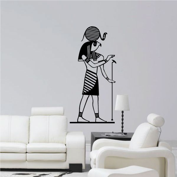 Egyptian wall decal of stylized pharaoh holding staff, black vinyl silhouette.