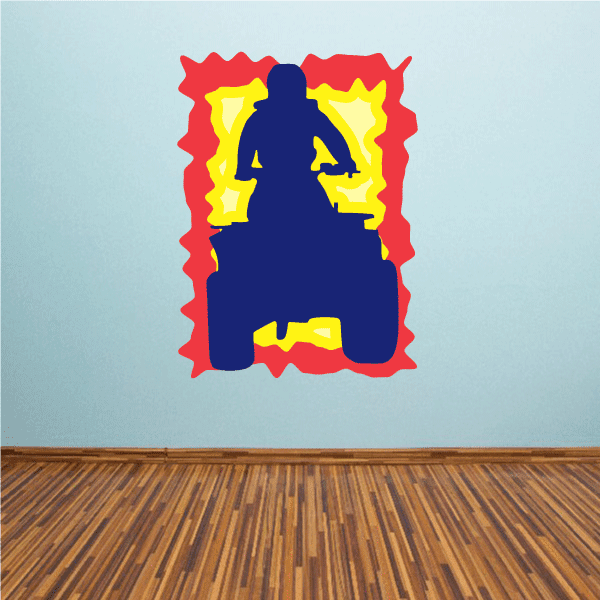 ATV sticker decal with red border, blue center, and yellow flame-style design