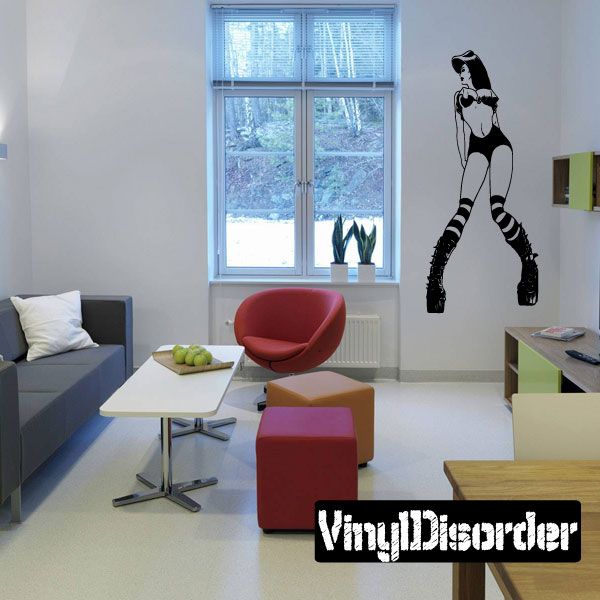 Raver girl wall decal with black-and-white striped socks and lace-up boots
