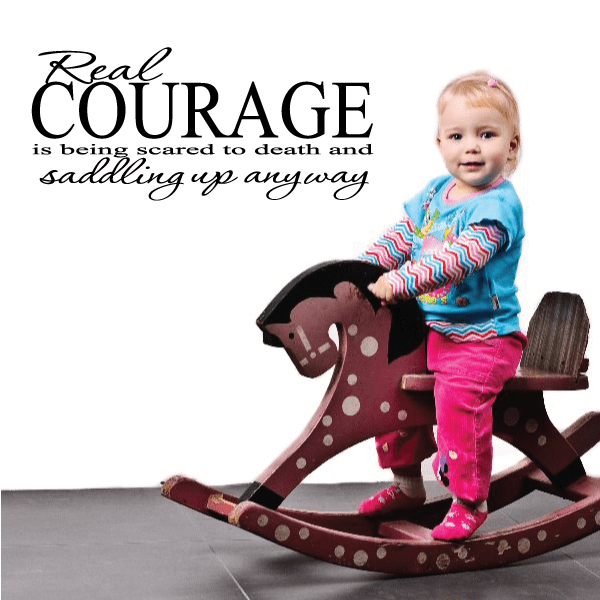Inspirational decal with text: “Real COURAGE” and “saddling up anyway”