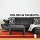 Wall decal with bold black-and-white text: REAL MEN DO HOUSEWORK